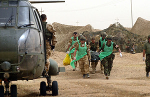 An injured Service person being medically evacuated by air from theatre