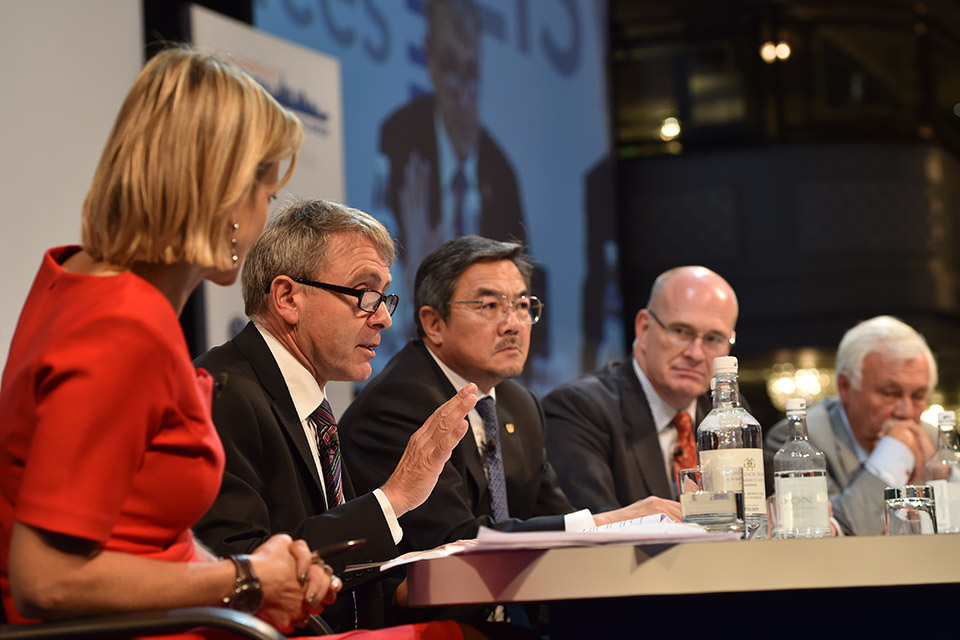 Robert Goodwill with other panelists at conference