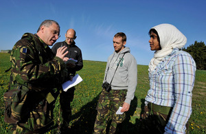 Flight Lieutenant (then Flying Officer) Tony Newton working with 'journalists' and 'humanitarian workers' on Exercise Chiltern Kite on Salisbury Plain earlier this year