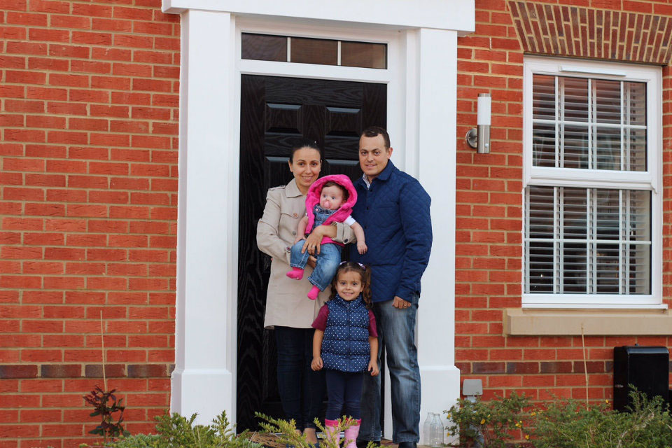Lance Bombardier Joel Daye with his family at home in Hampshire. Crown copyright. All rights reserved.