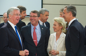 Defence Secretary Michael Fallon, left, attends the NATO Defence Ministerial in Brussels. Picture: NATO