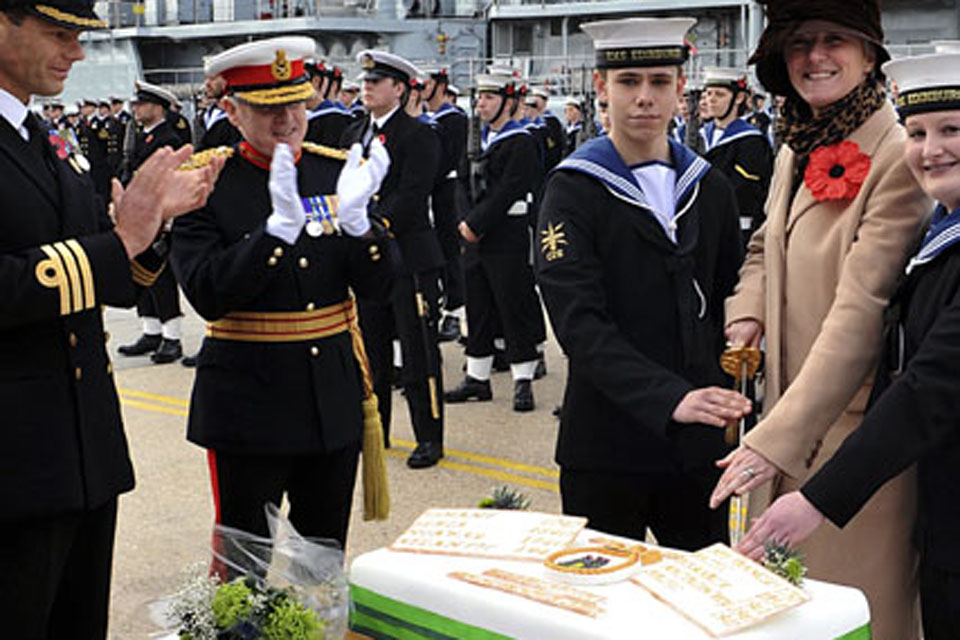 Able Seaman Jonathan Thorne, Lieutenant Commander Gillian Russell and Able Seaman Katie Hickman cut the traditional rededication cake