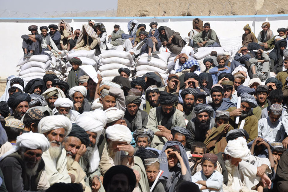 Afghan farmers gather for the wheat seed distribution programme in 2009