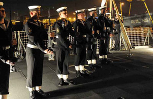 Members of HMS Iron Duke's ship's company form a Guard of Honour