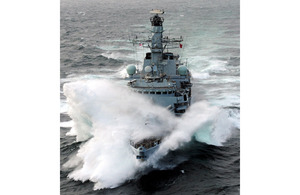 HMS Iron Duke pictured in rough weather in the Indian Ocean