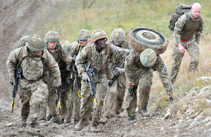 Soldiers taking part in a 'forced march' across the Goldgrund training area to resupply a Warrior armoured fighting vehicle