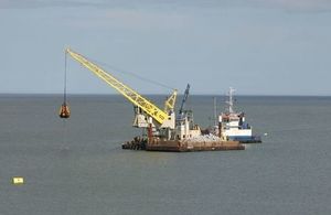 Strekker, the crane barge, which is removing debris from the dredge site. Copyright Boskalis Westminister Ltd. All rights reserved.