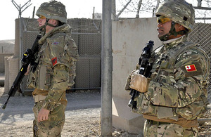 A Tongan marine teams up with a RAF Police colleague to provide security as part of Camp Bastion's Force Protection Wing