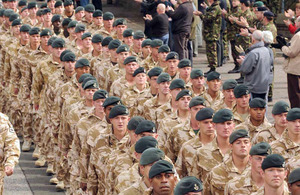 Members of the 3 RIFLES Battle Group march