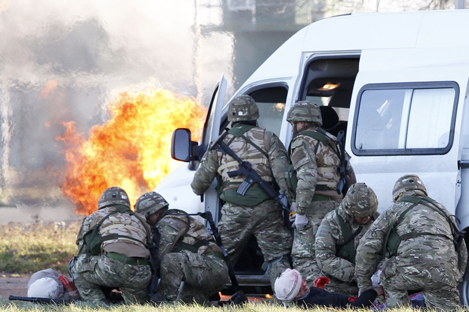 Tongan troops tend to 'casualties' in a realistic Mission Rehearsal Exercise at RAF Honington