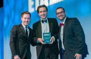 Crowd Connected founder James Cobb holding one of his Event Technology Awards 2015, flanked by presenter Andrew Ryan and sponsor Julius Solaris