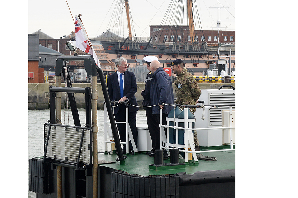 SECRETARY OF STATE VISITS HMNB PORTSMOUTH  Today, 14th December 2015, Secretary of State Rt Hon Michael Fallon visited the dredging site at HMNB Portsmouth where the new Queen Elizabeth aircraft carrier will be berthed. 