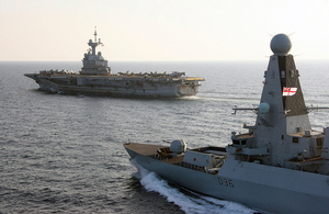 Type 45 destroyer HMS Defender with French aircraft carrier Charles de Gaulle. Crown Copyright.