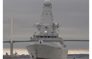 HMS Dauntless sails under the Queen Elizabeth II Bridge at Dartford