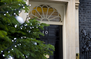 Christmas tree by Number 10 Downing Street front door.
