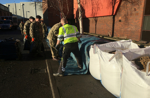 Creating temporary flood defence on the River Aire in Leeds