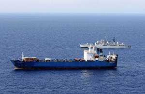 HMS Liverpool shadows a vessel off the Libyan coast