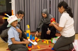 Children playing with adults