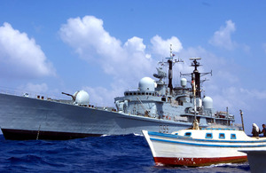HMS Manchester alongside the smugglers' craft