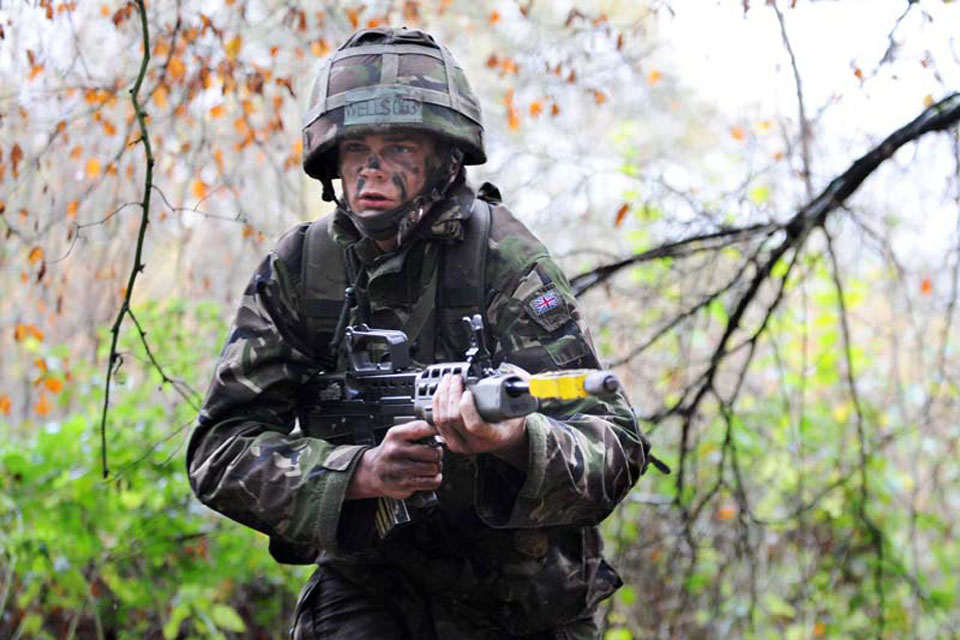 Aircraftman Daryl Wells taking part in fire and manoeuvre drills during Exercise Blue Warrior 