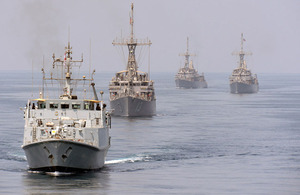 HMS Shoreham leads US mine countermeasures vessels USS Sentry, Devastator and Dextrous as they all fall into line astern of RFA Cardigan Bay