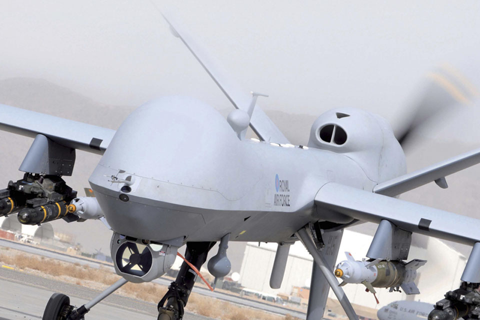 RAF Reaper Remotely Piloted Air System taxis along the runway at Kandahar Airfield, Afghanistan (stock image) 