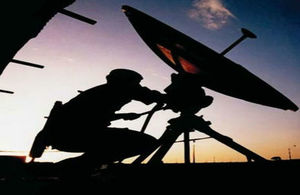 A soldier with a satellite receiver.