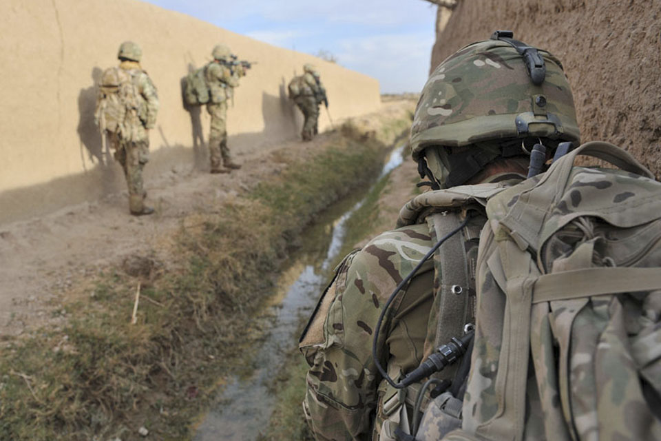 Troops from the Brigade Reconnaissance Force patrol cautiously through the northern Nahr-e Saraj district during Operation EAGLE'S SHADOW 