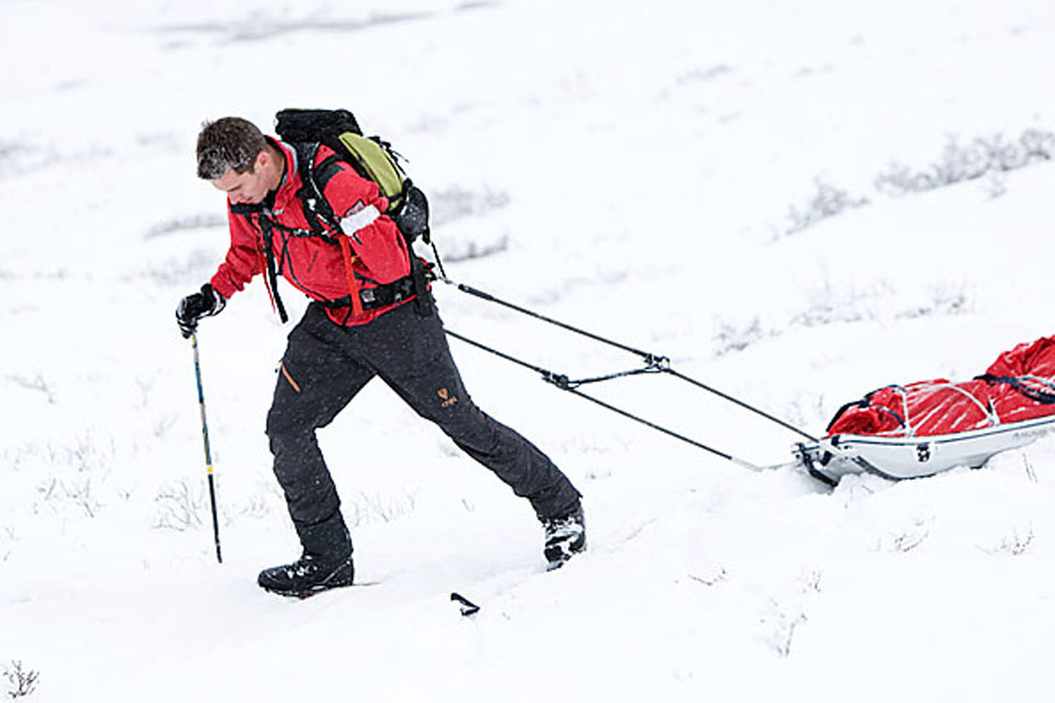 Private Jaco van Gass pulls his sledge across the snow during Arctic training