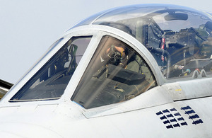 A Tornado GR4 pilot prepares to take off from Gioia del Colle air base in southern Italy for a mission over Libya