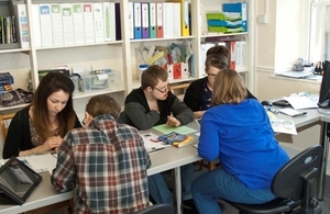 Young people in classroom.