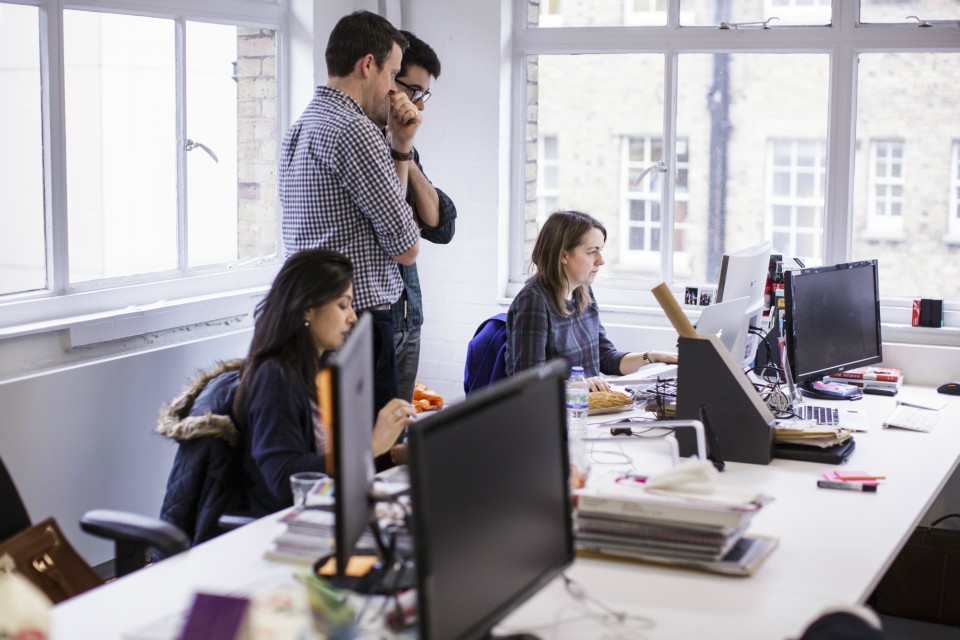 Jenny Griffiths, founder Snap fashion with staff at her office