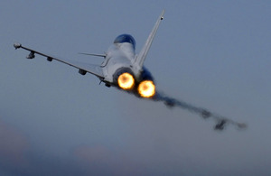 An RAF Typhoon pilot applies the afterburners as the aircraft takes off (stock image)