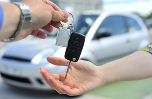 A set of keys being handed over