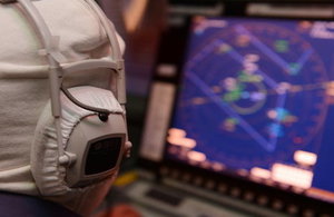 A radar operator in the operations room onboard Type 23 frigate HMS Monmouth.