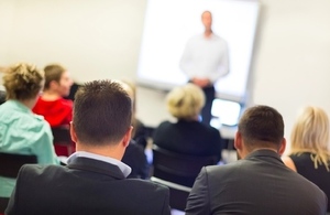 Speaker presenting at business workshop