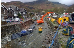 Digger in river at Glenridding, Cumbria