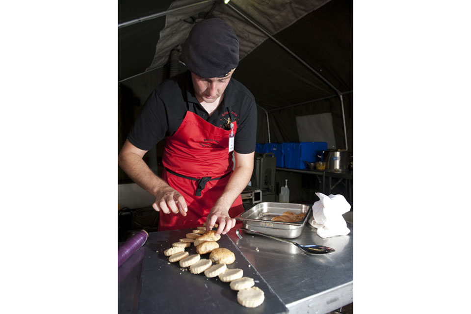 A member of 19th Regiment Royal Artillery's team based at Tidworth competes in the Afghan Open Buffet at Exercise Joint Caterer