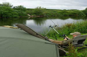 Angler enjoying the peace and beautiful weather