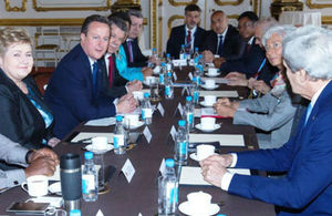 Tanzanian PM with British PM and other world leaders at the London Anti Corruption Summit, 12th May