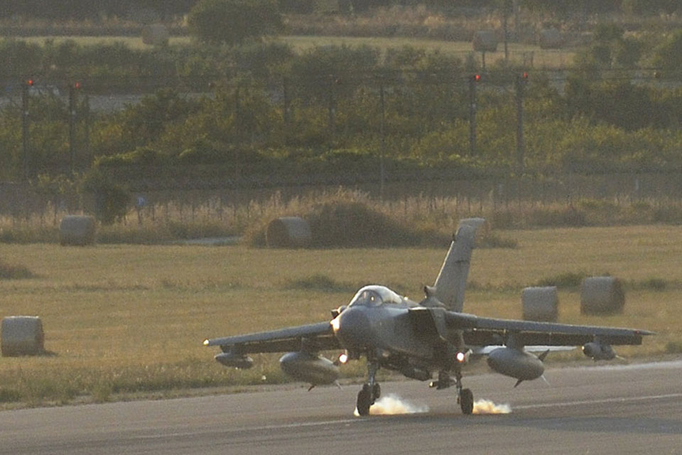 One of the four additional RAF Tornado GR4 jets touches down at Gioia del Colle air base in southern Italy 