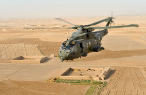 A Merlin helicopter from 1419 Flight providing air support for troops on the ground in Afghanistan