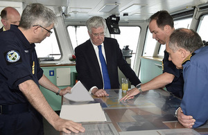 Vice Admiral Johnstone, Defence Secretary Michael Fallon and Captain Gardner (L-R) talking on the Bridge of RFA Cardigan Bay. Crown Copyright.