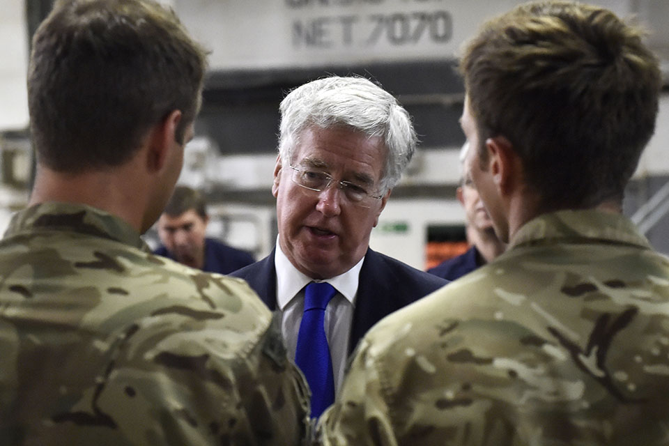 Defence Secretary Michael Fallon talking to Royal Marines on the Vehicle Deck on RFA Cardigan Bay. Crown Copyright. 