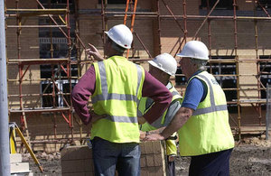 Photo of builders on a building site