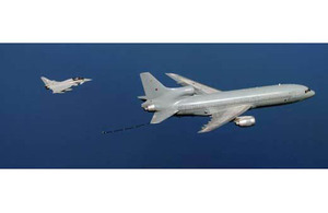 A Royal Air Force Typhoon flies off the tail of an RAF L-1011 TriStar aerial refuelling tanker from 216 Squadron based at RAF Brize Norton