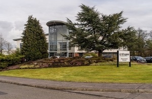 Critiqom's office in Glasgow, surrounded by greenery