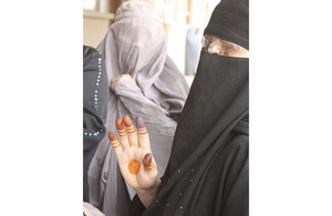 An Afghan woman has decorated her hand to hide the ink stain which shows that she has ignored Taliban threats and voted in the Afghan parliamentary elections (stock image)