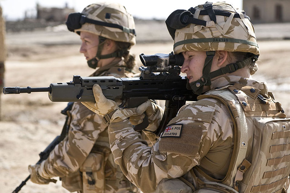 Two female British soldiers are pictured on patrol in Lashkar Gah, Helmand, southern Afghanistan (stock image)