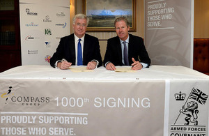 Compass Group UK & Ireland Managing Director Dennis Hogan signs the Armed Forces Covenant with Defence Secretary Michael Fallon.